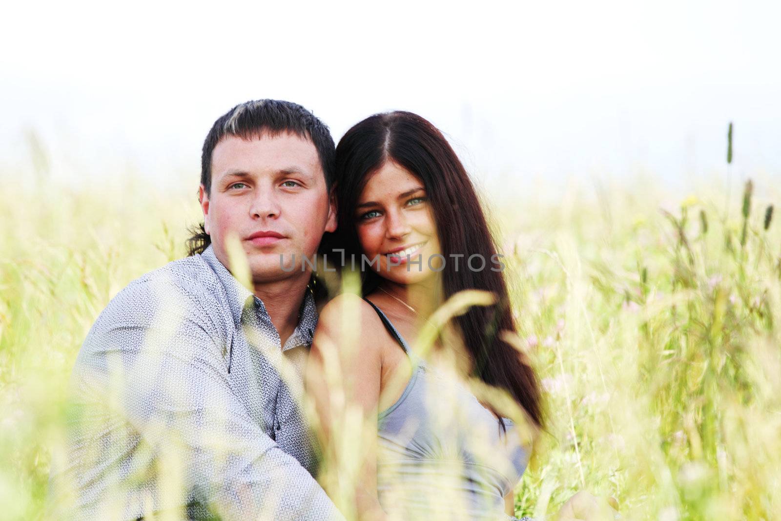 two lovers on grass field
