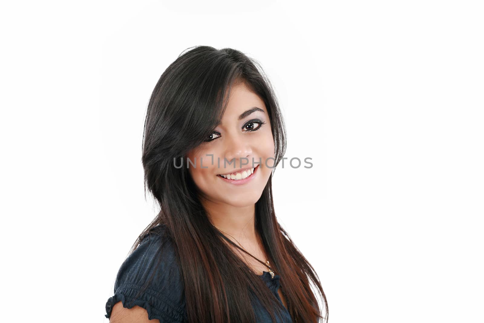 Portrait of a happy woman smiling against white background by dacasdo