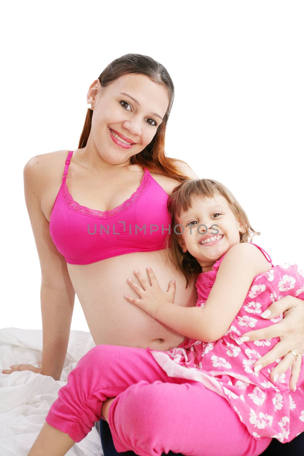 Beautiful pregnant woman with her daughter by dacasdo