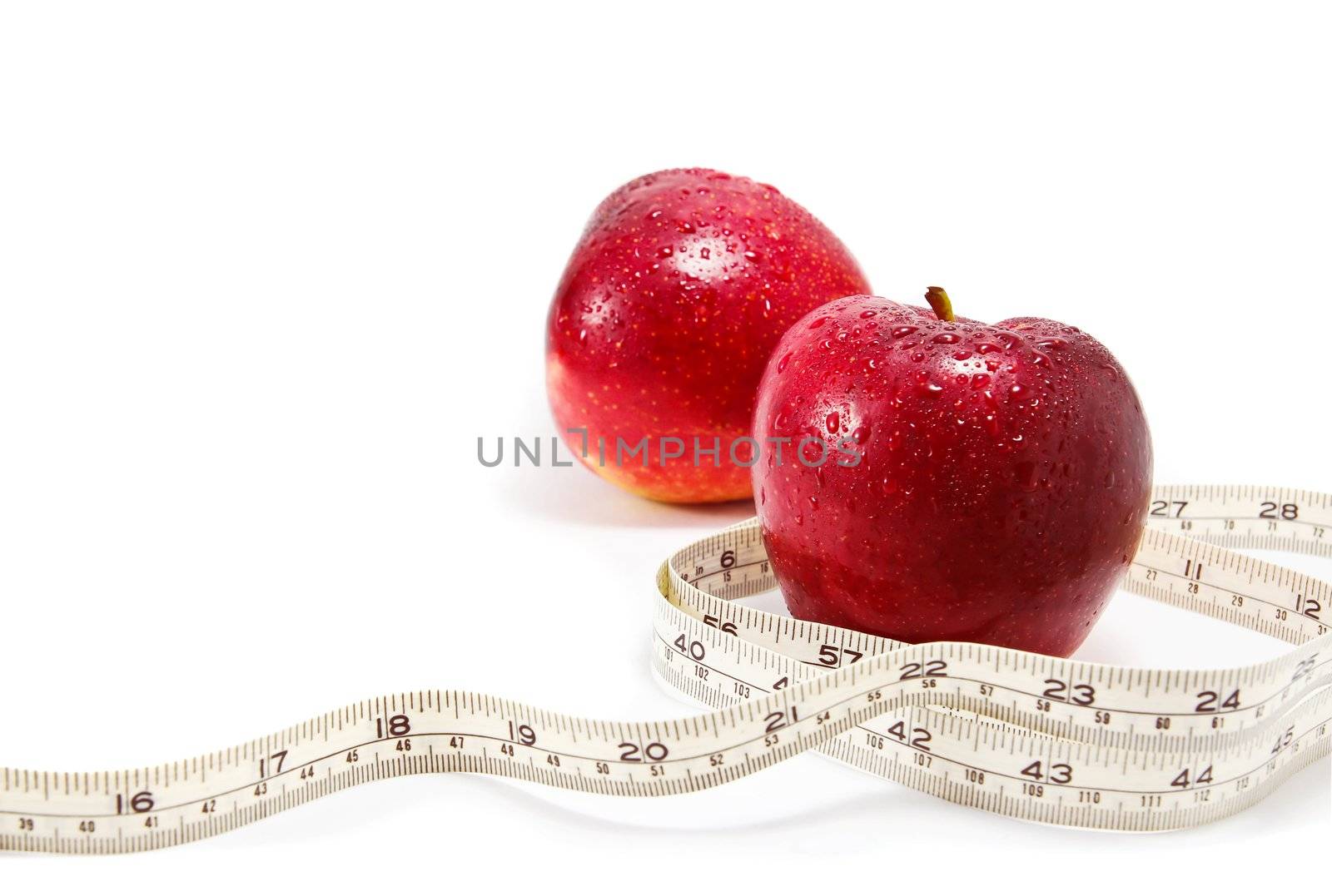 Apple and tape on white background