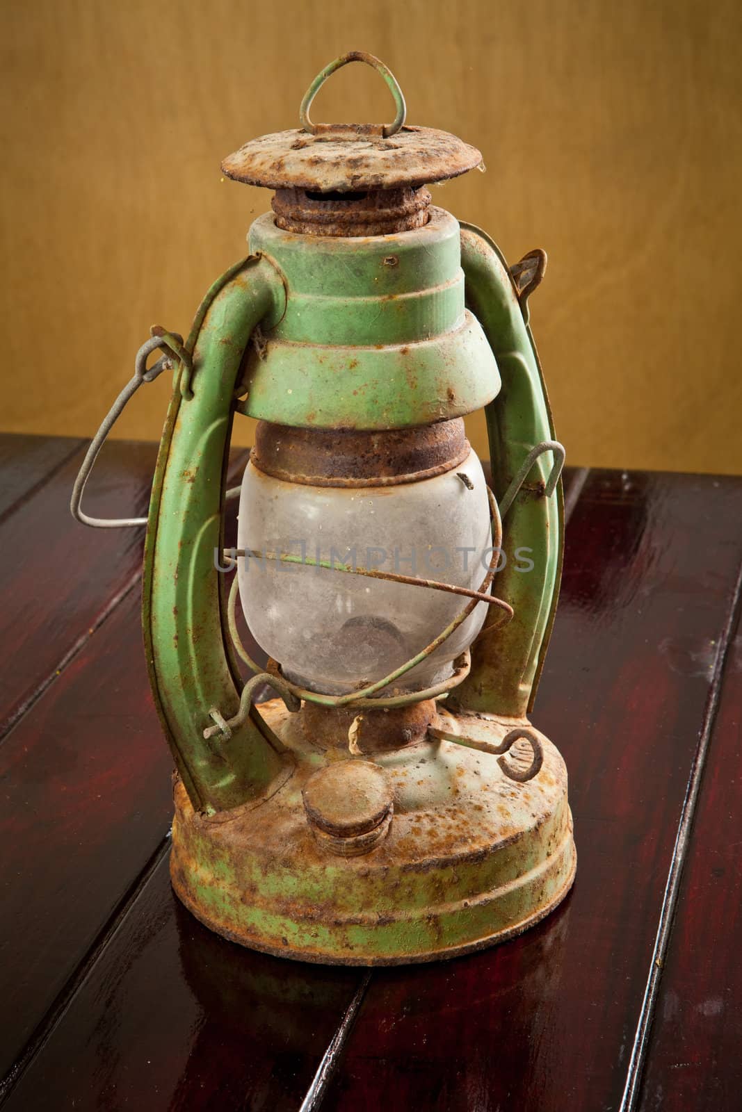 Vintage lamp isolated on wood table background