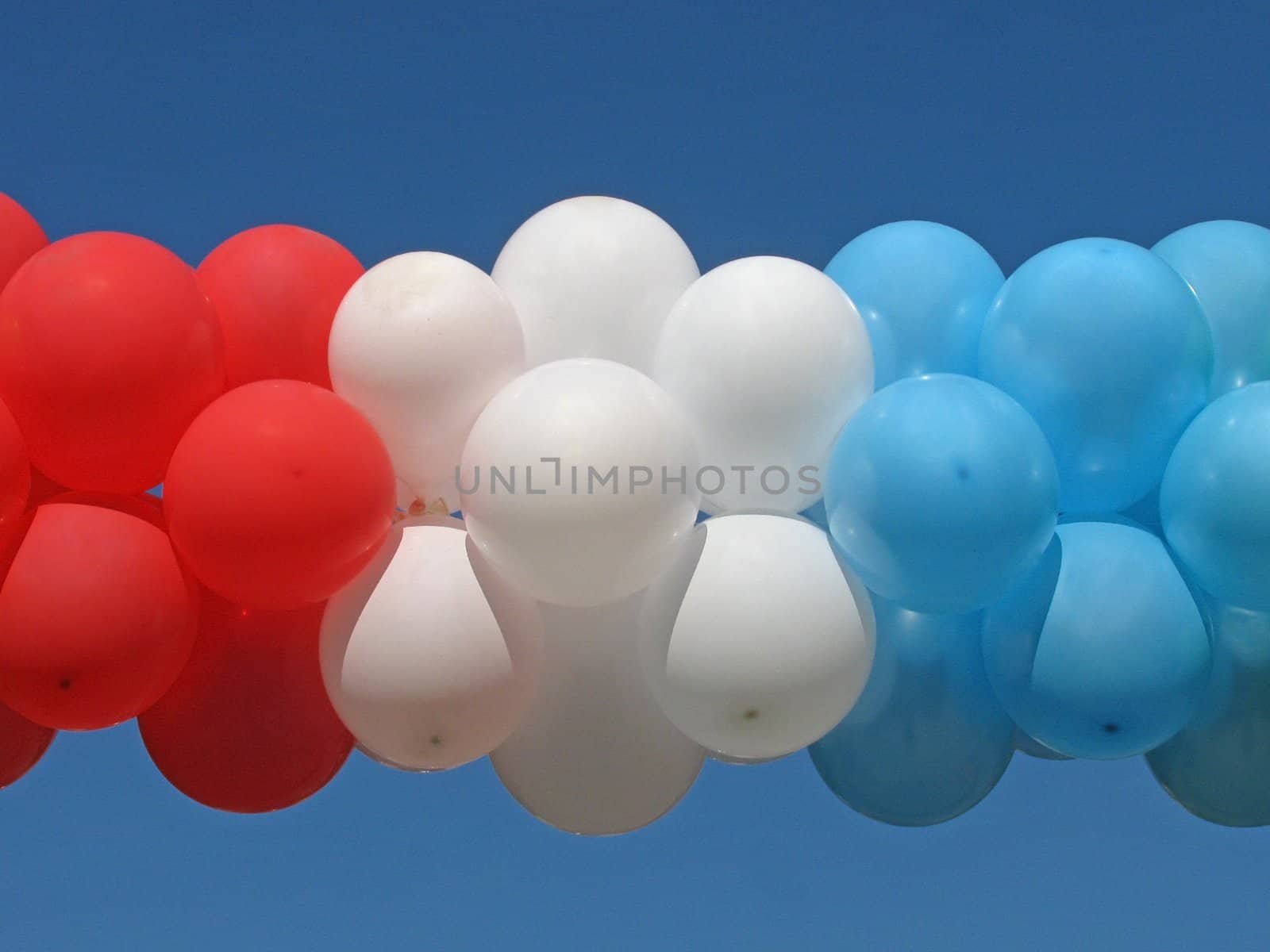 bunch of balloons over blue sky