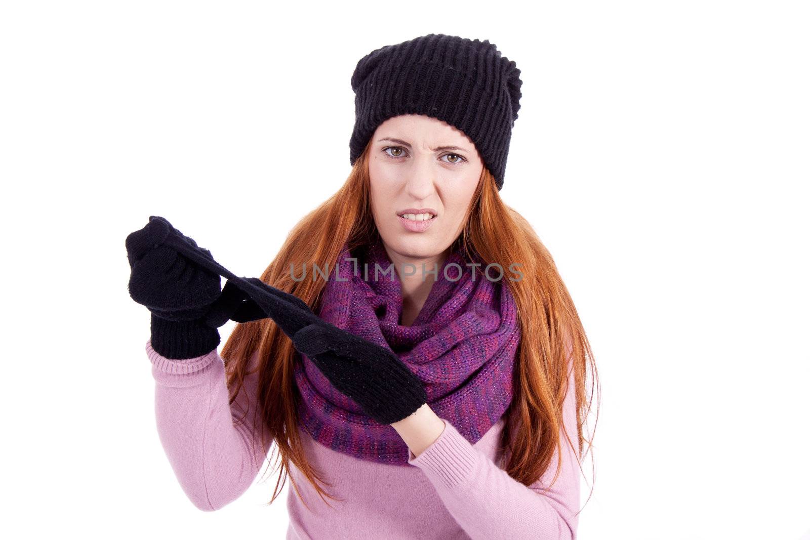 young beautiful woman with hat gloves and scarf in winter isolated on white