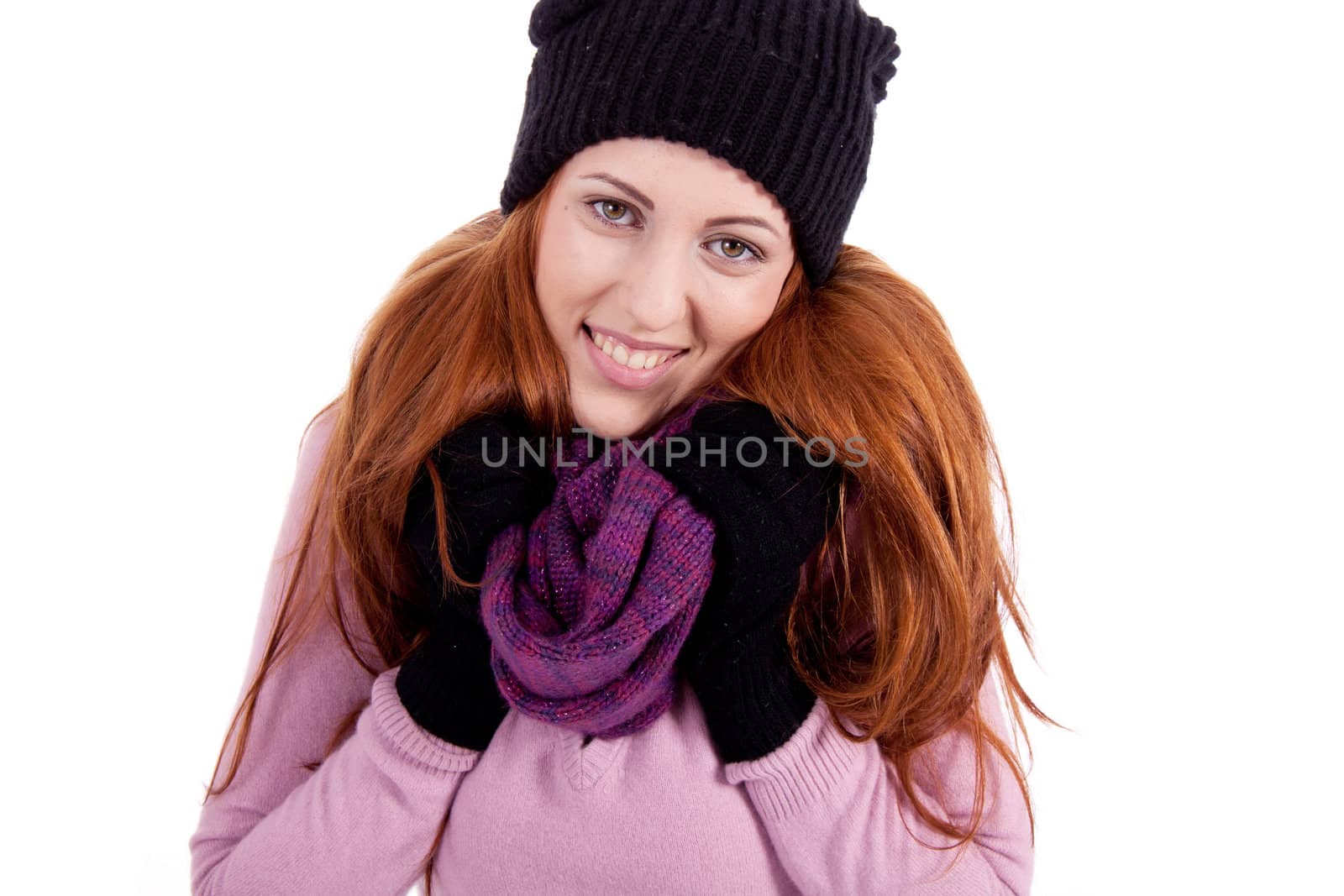 young beautiful woman with hat gloves and scarf in winter isolated on white