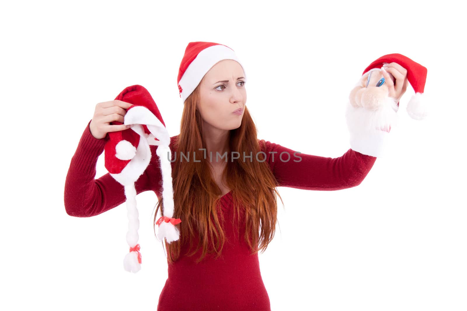 smiling young woman at christmastime in red clothes isolated by juniart