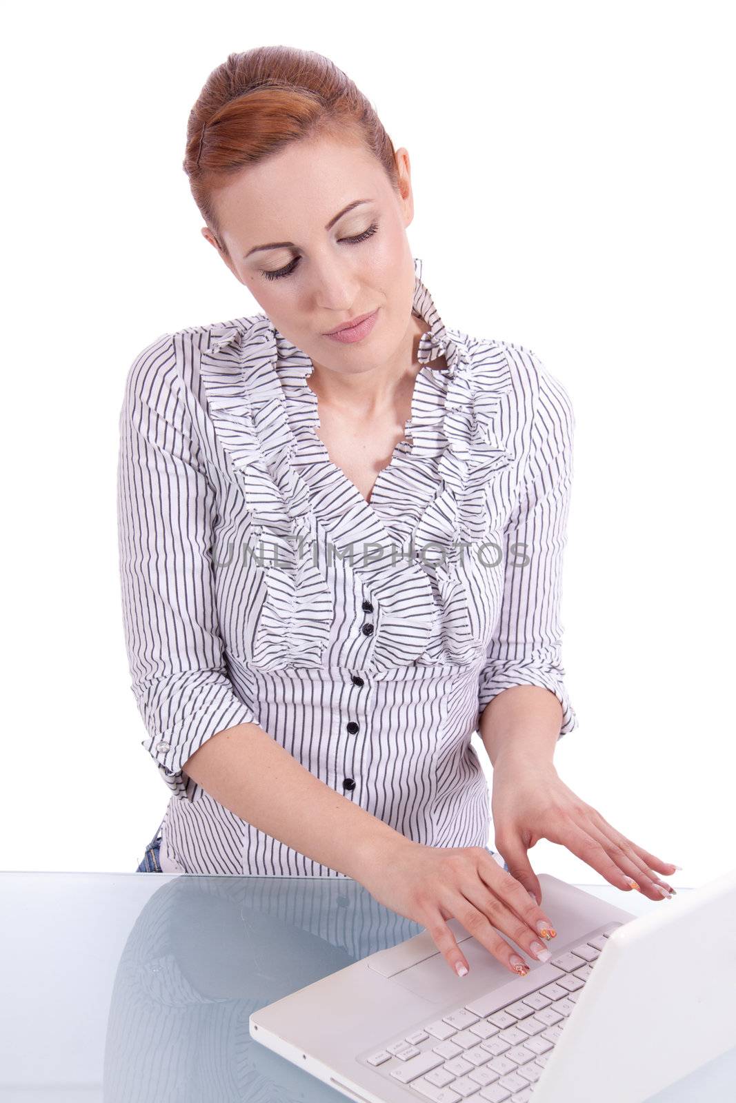 young business woman on computer with snack isolated on white