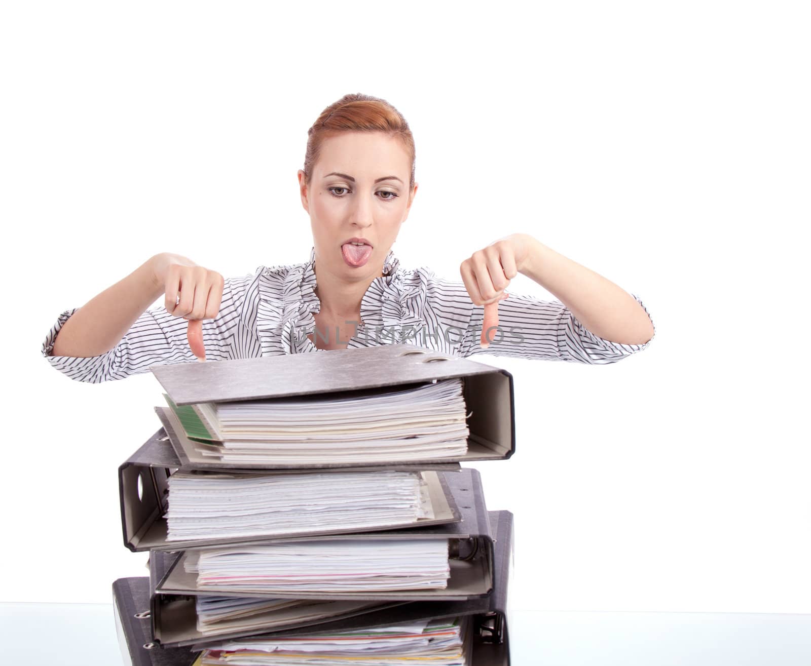 business woman in office looks at unbelievable folder stack isolated on white