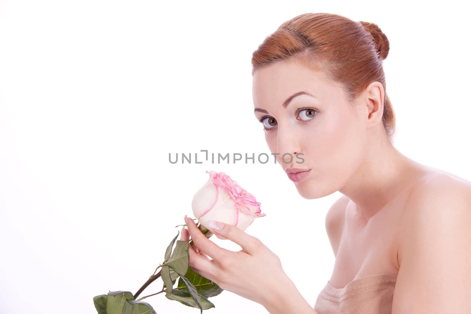 beautiful young woman holding pink rose isolated on white