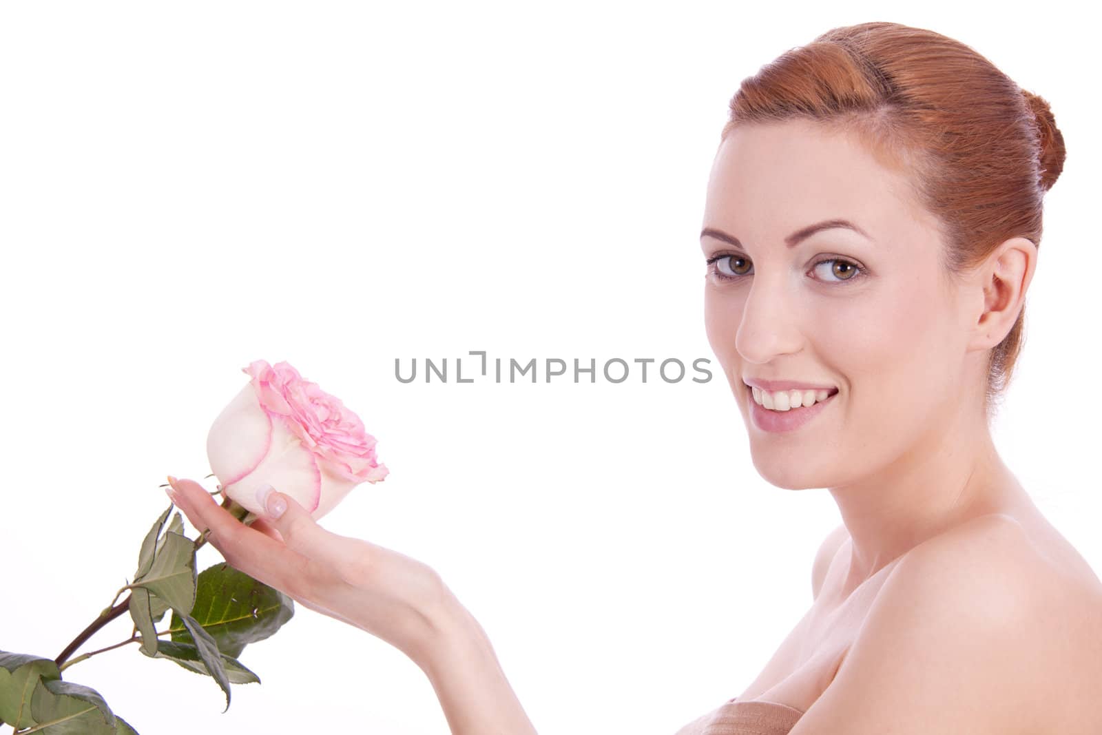 beautiful young woman holding pink rose isolated on white