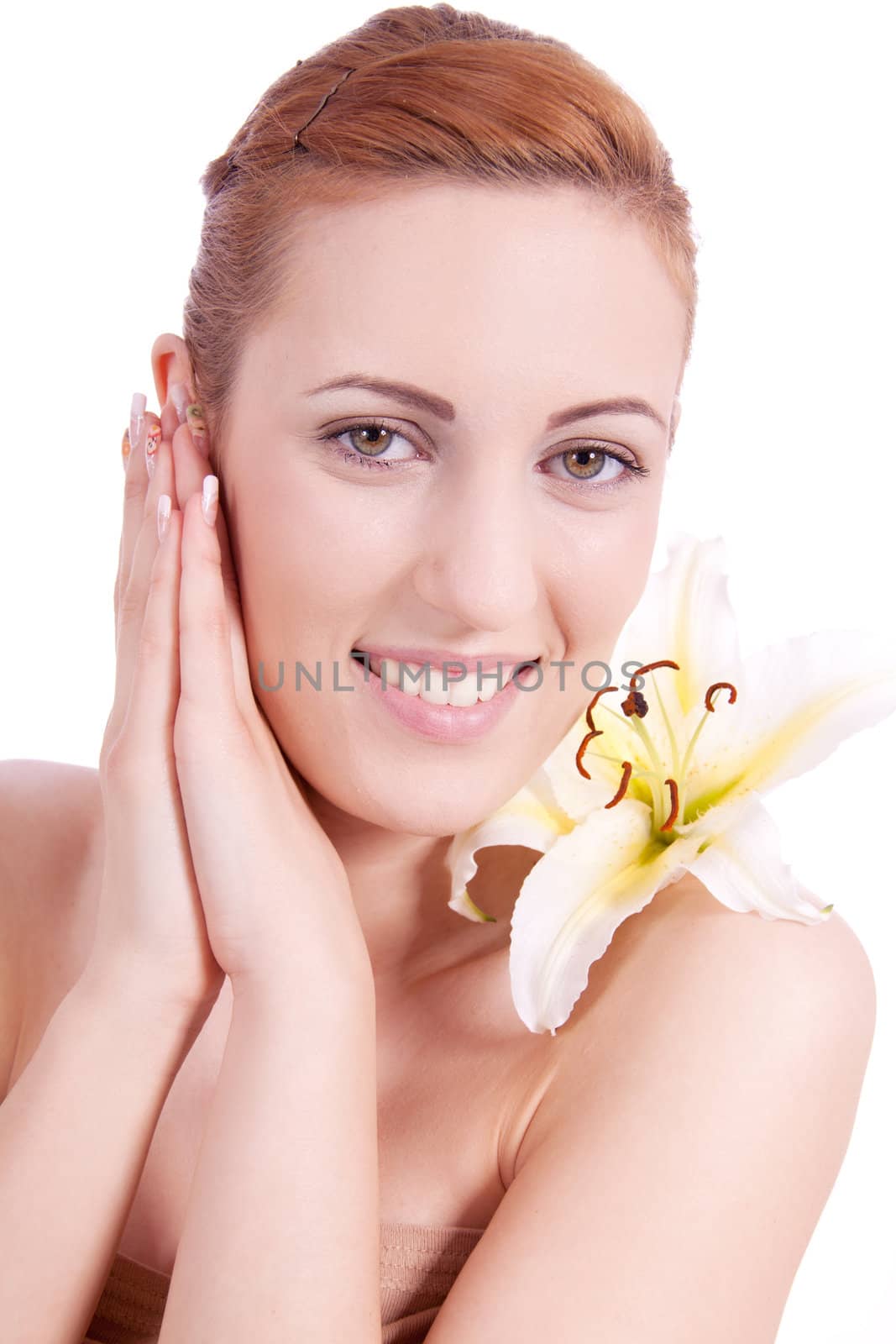 beautiful natural woman face with flower isolated on white