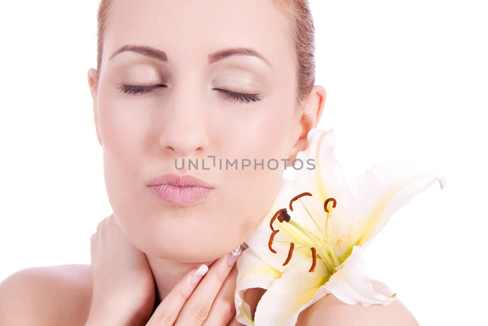 beautiful natural woman face with flower isolated on white