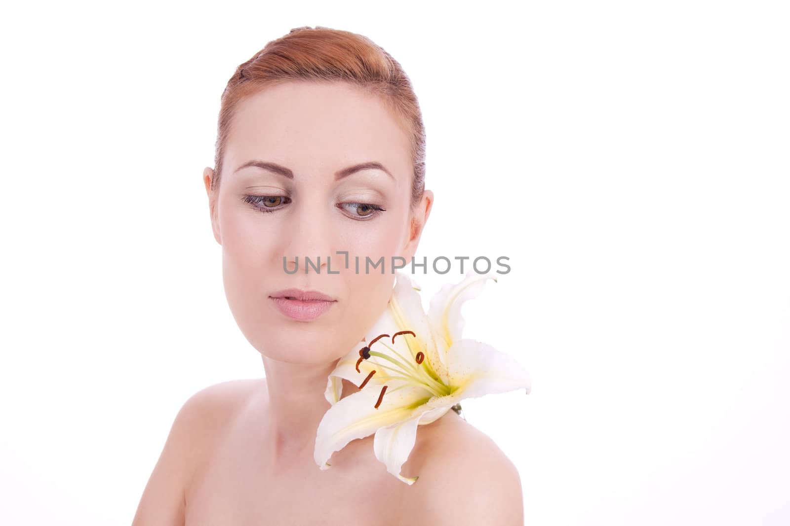 beautiful natural woman face with flower isolated on white