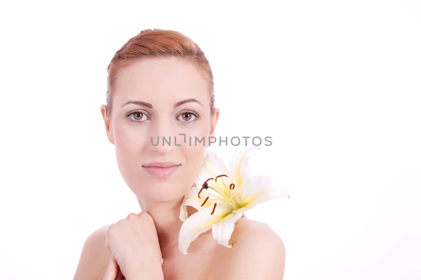 beautiful natural woman face with flower isolated on white