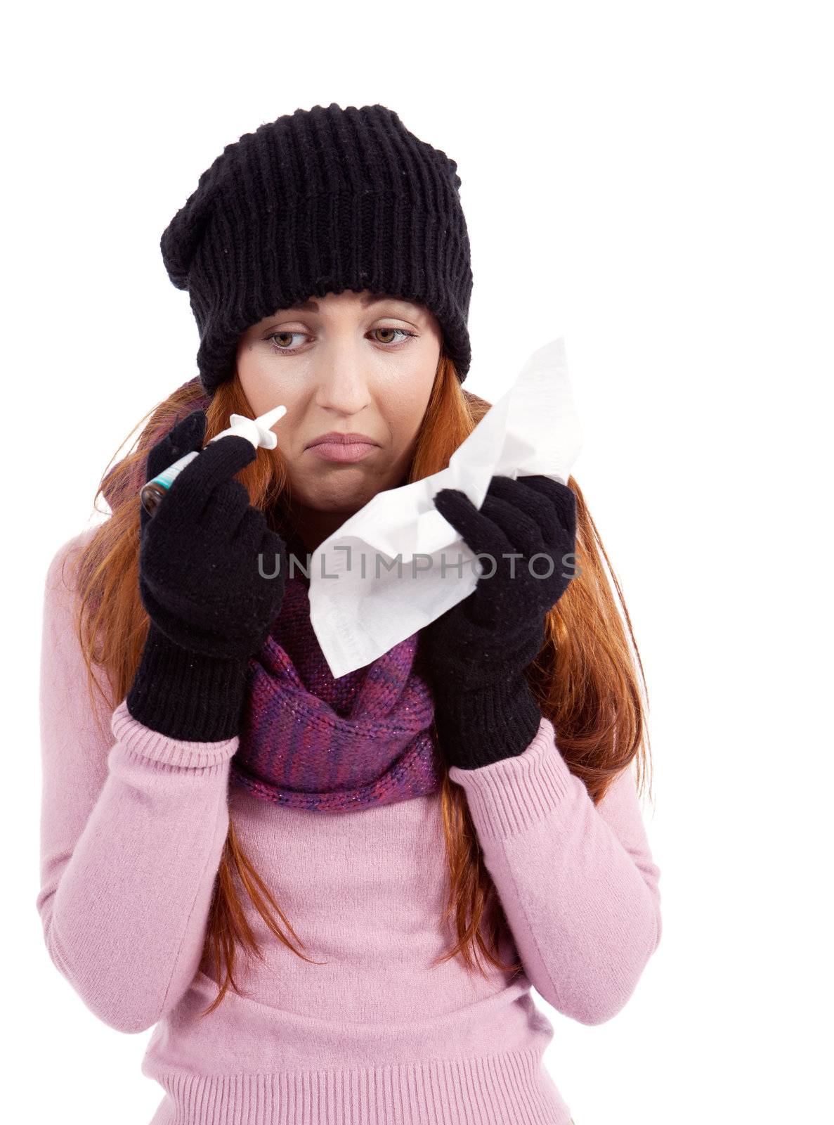 woman with tissue and spray feels unwell with flu isolated on white