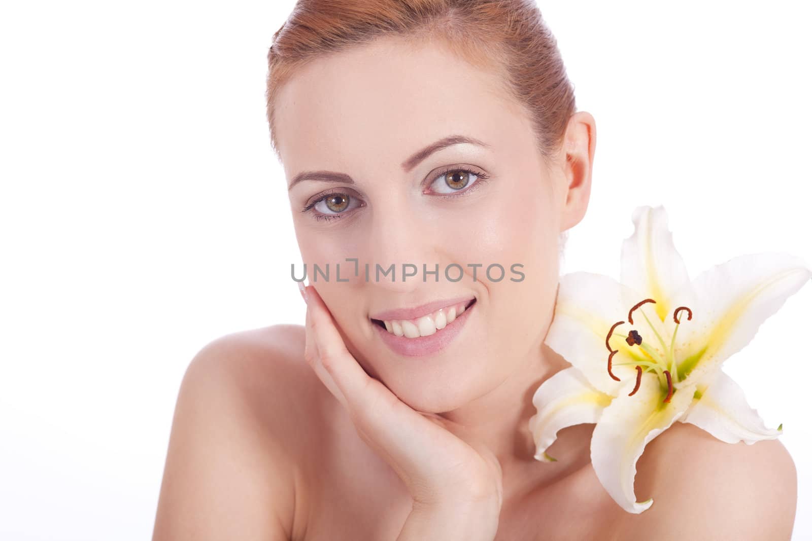 beautiful natural woman face with flower isolated on white