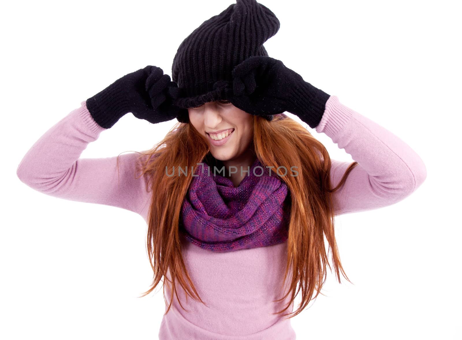 young beautiful woman with hat gloves and scarf in winter isolated on white