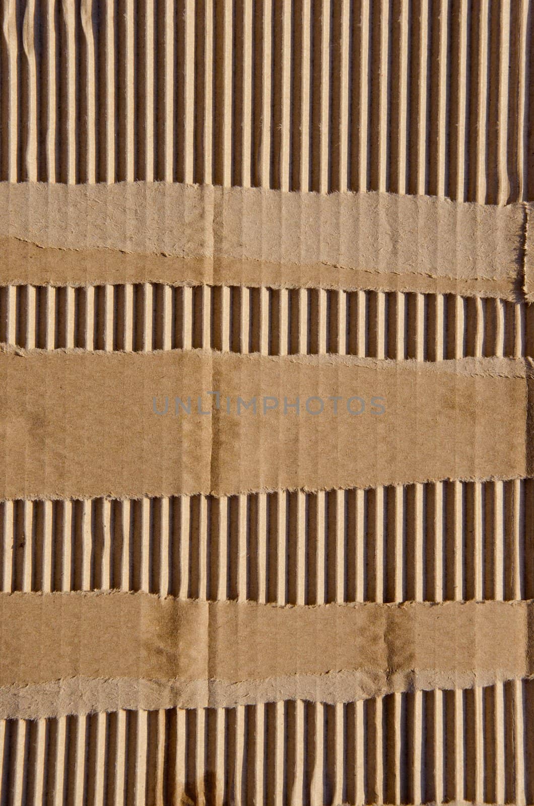 Paper box background. Fragment of packing box wall. Backdrop. Wallpaper.