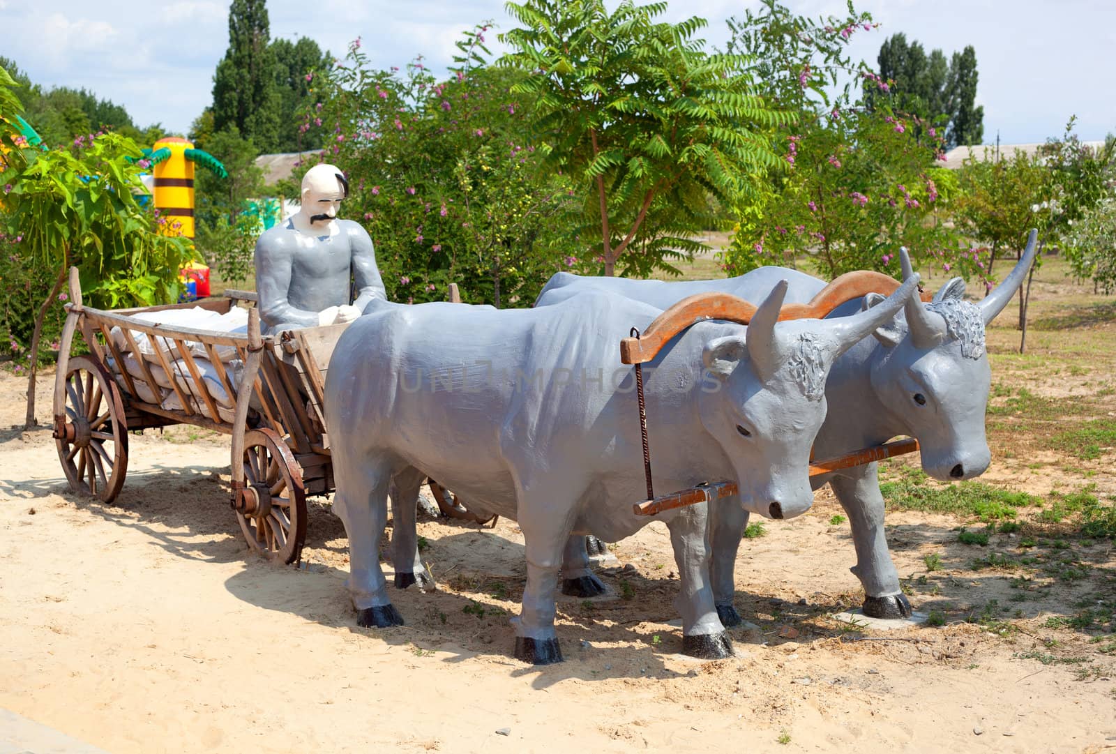 Monument to Ukrainian Cossack in a cart with the bulls