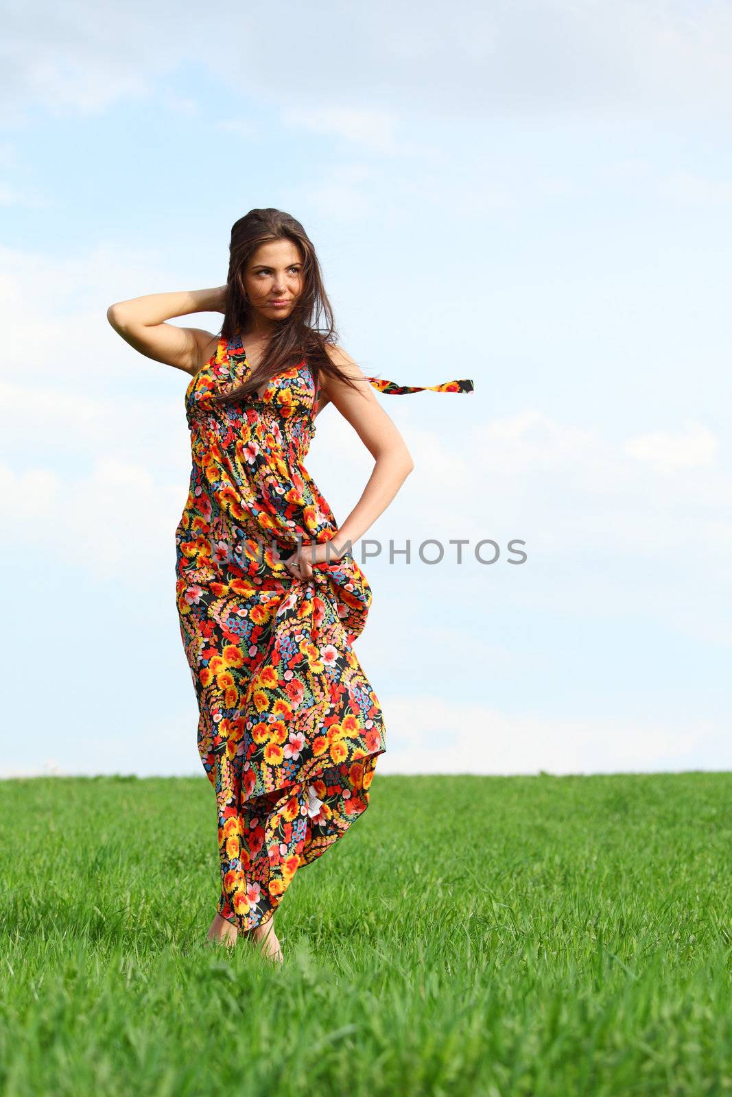 happy woman on green grass 