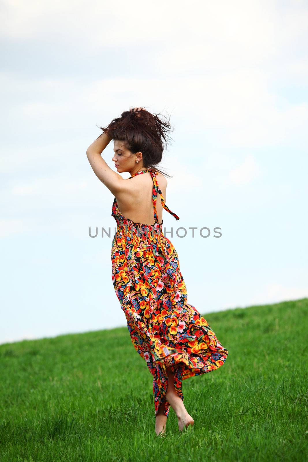 happy woman on green grass 