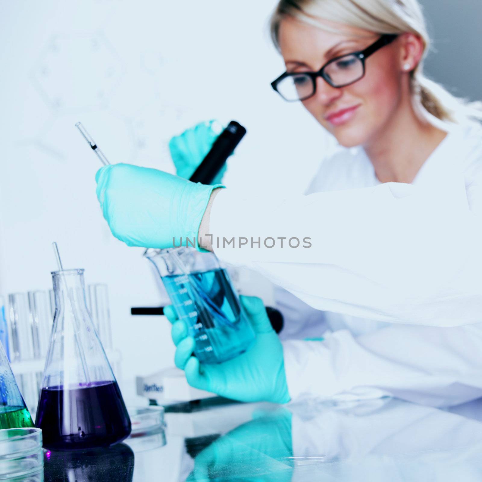  two scientist in chemical lab conducting experiments