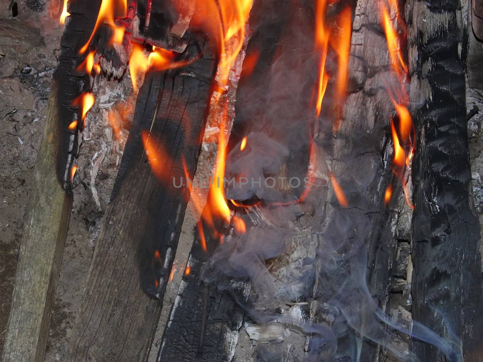 Bonfire of the old dried boards at night