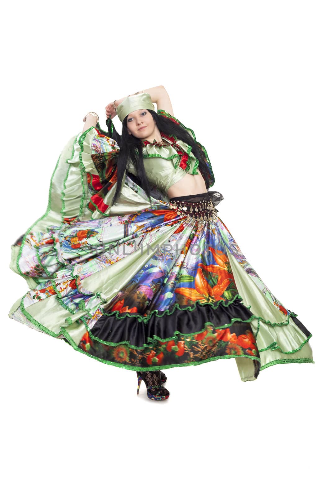 Image of gipsy dancer in traditional dress in motion