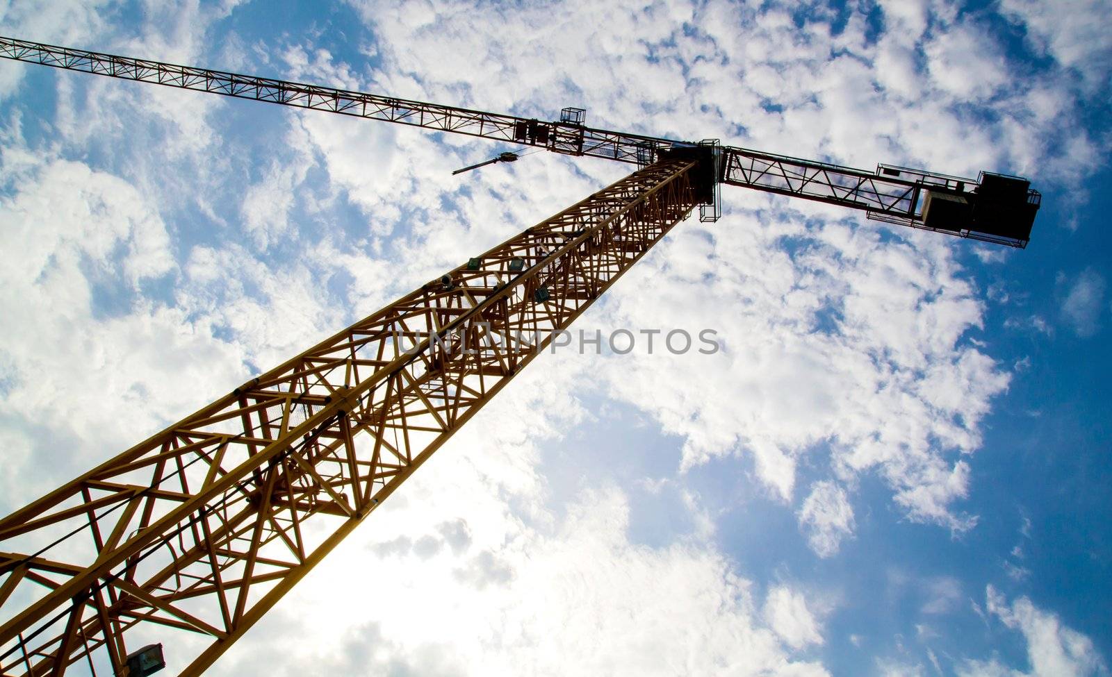 Construction crane at blue sky