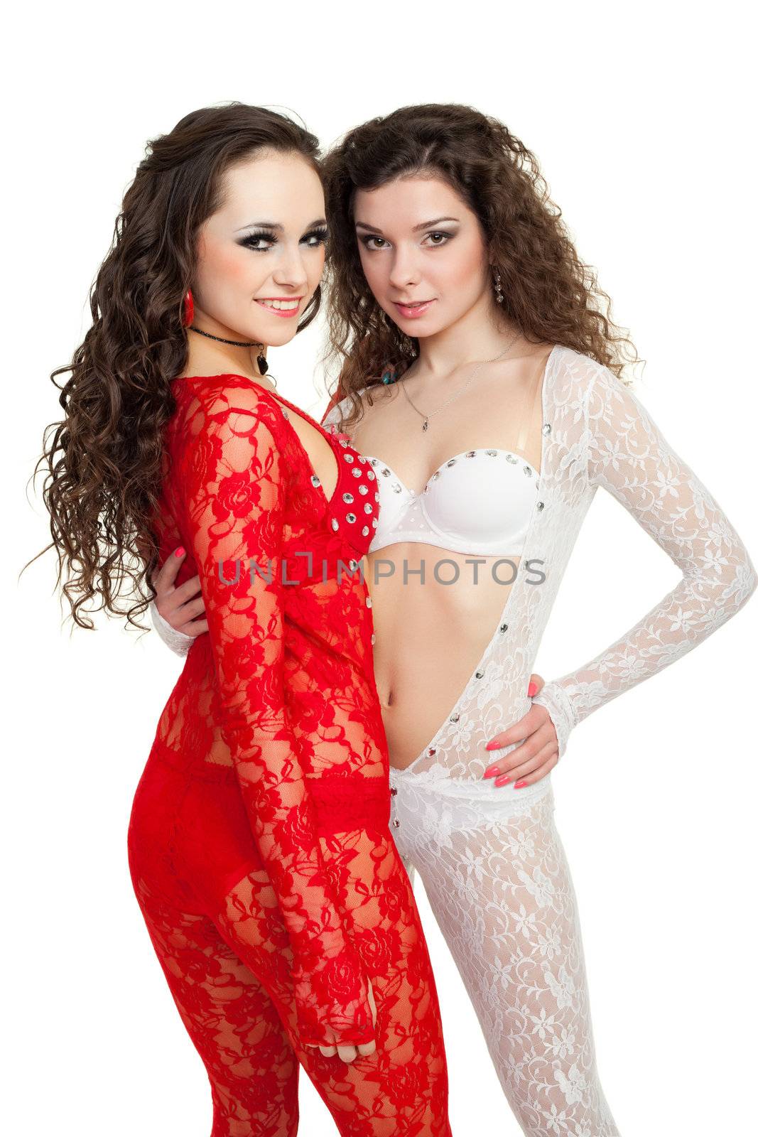 Sexy dancers in piquant dresses posing for photo