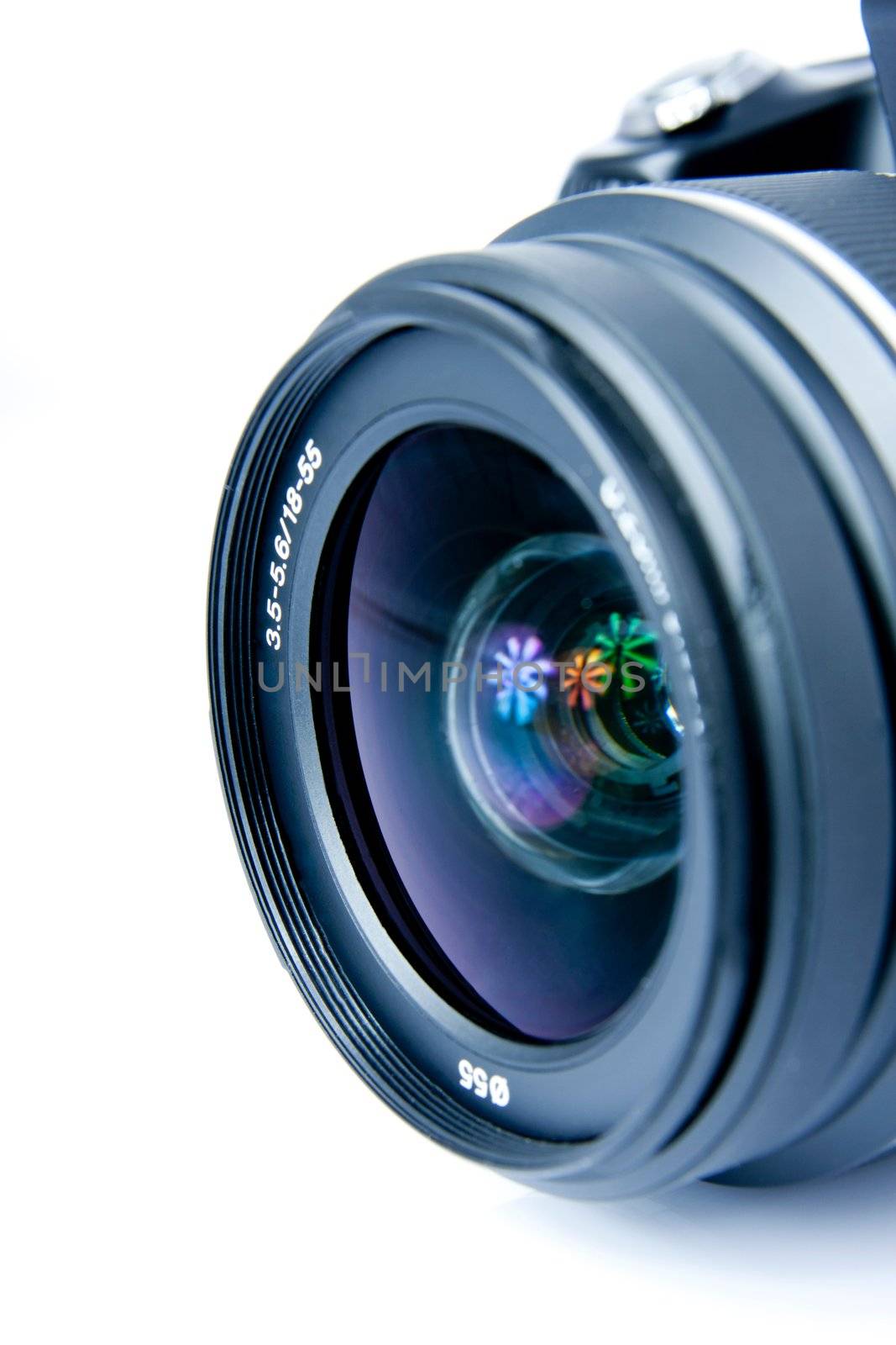 Digital photo camera, lens, closeup, isolated on white
