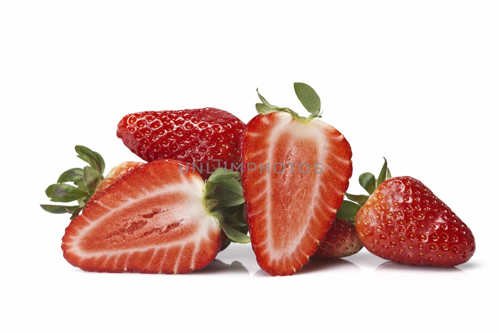 Fresh strawberries isolated on a white background.