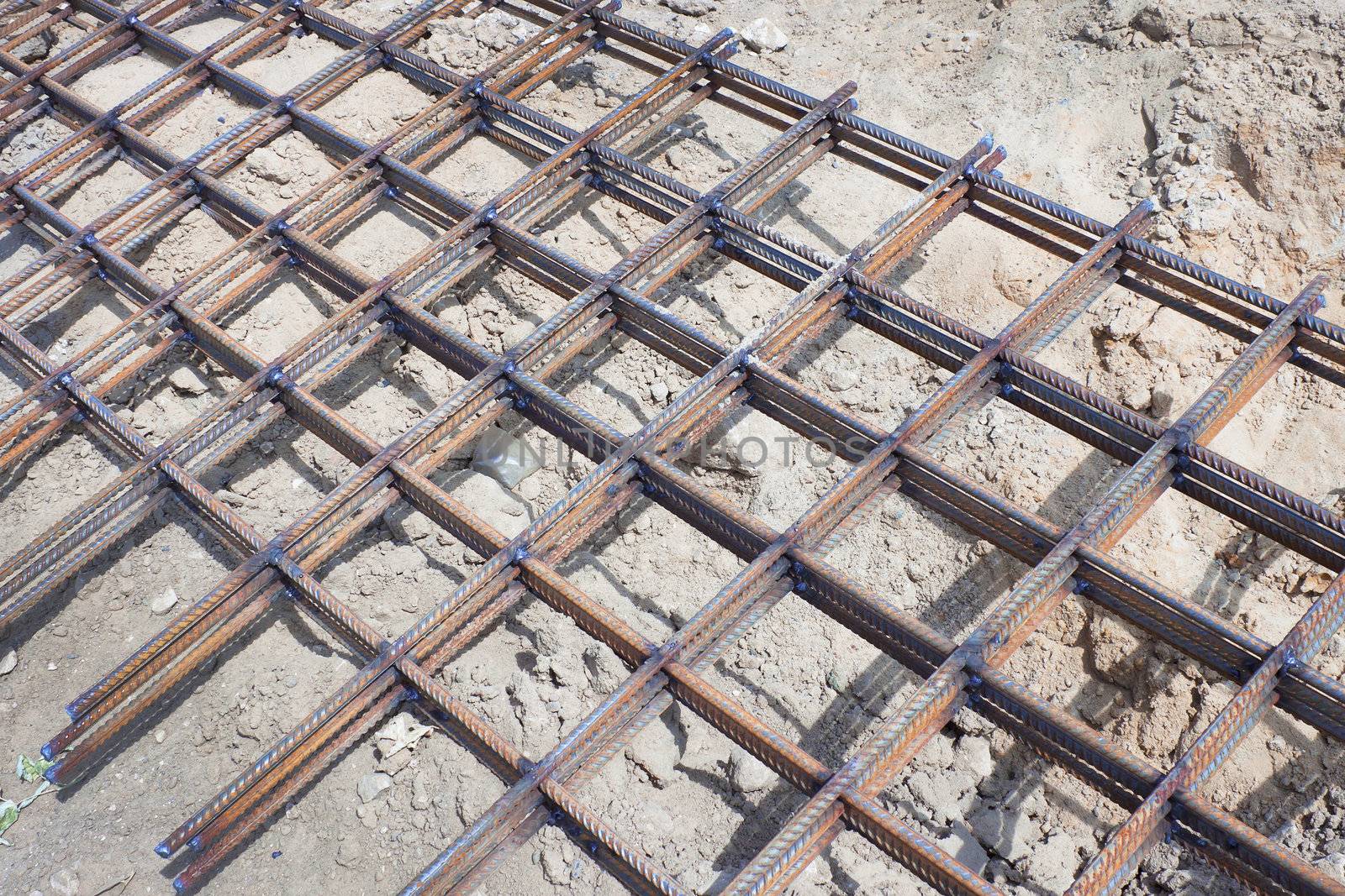 The lattice of rebar at the bottom of pit