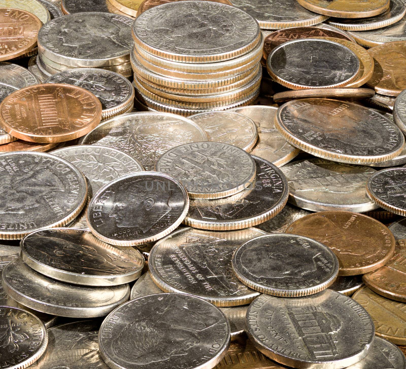 Macro image in deep focus of a pile of USA currency coins in stacks