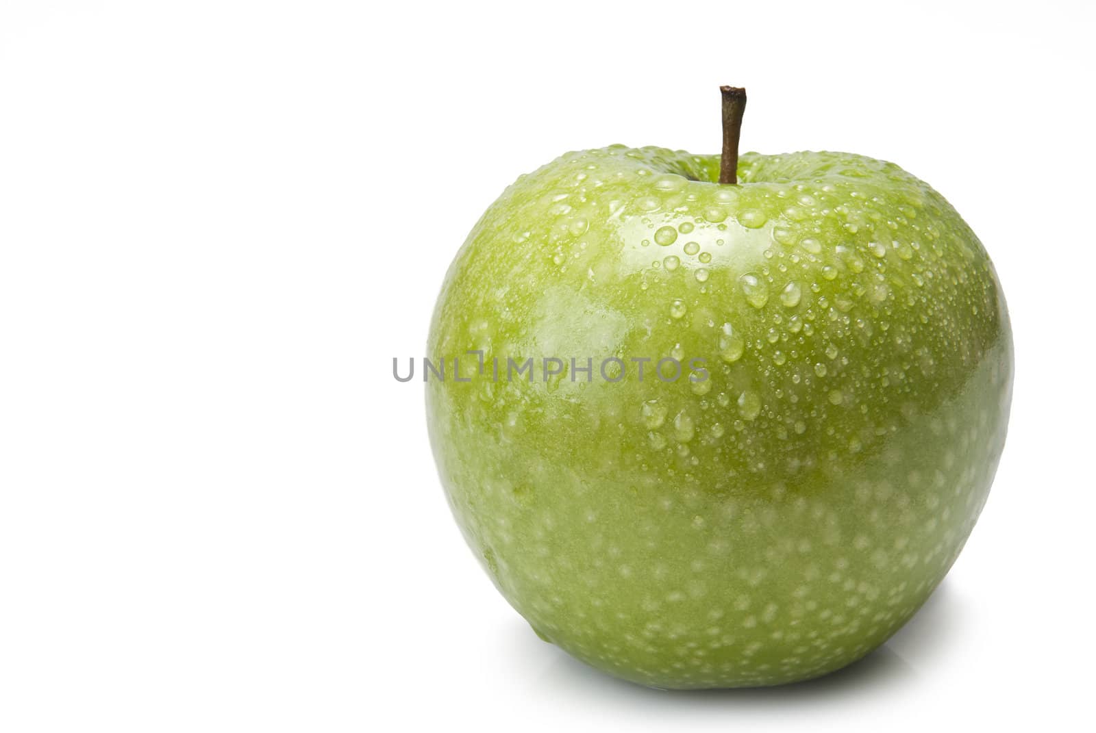 Apple covered with dew droplets. by angelsimon