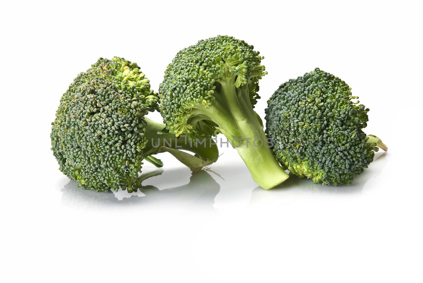 Fresh broccoli isolated over a white background.