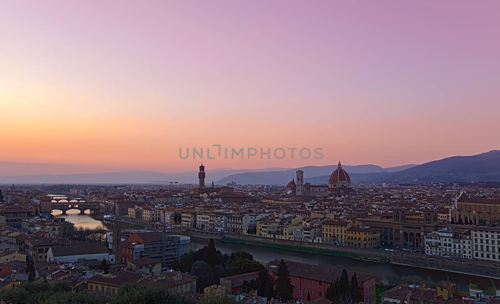 Beautiful sunset over the river Arno in Florence, Italy