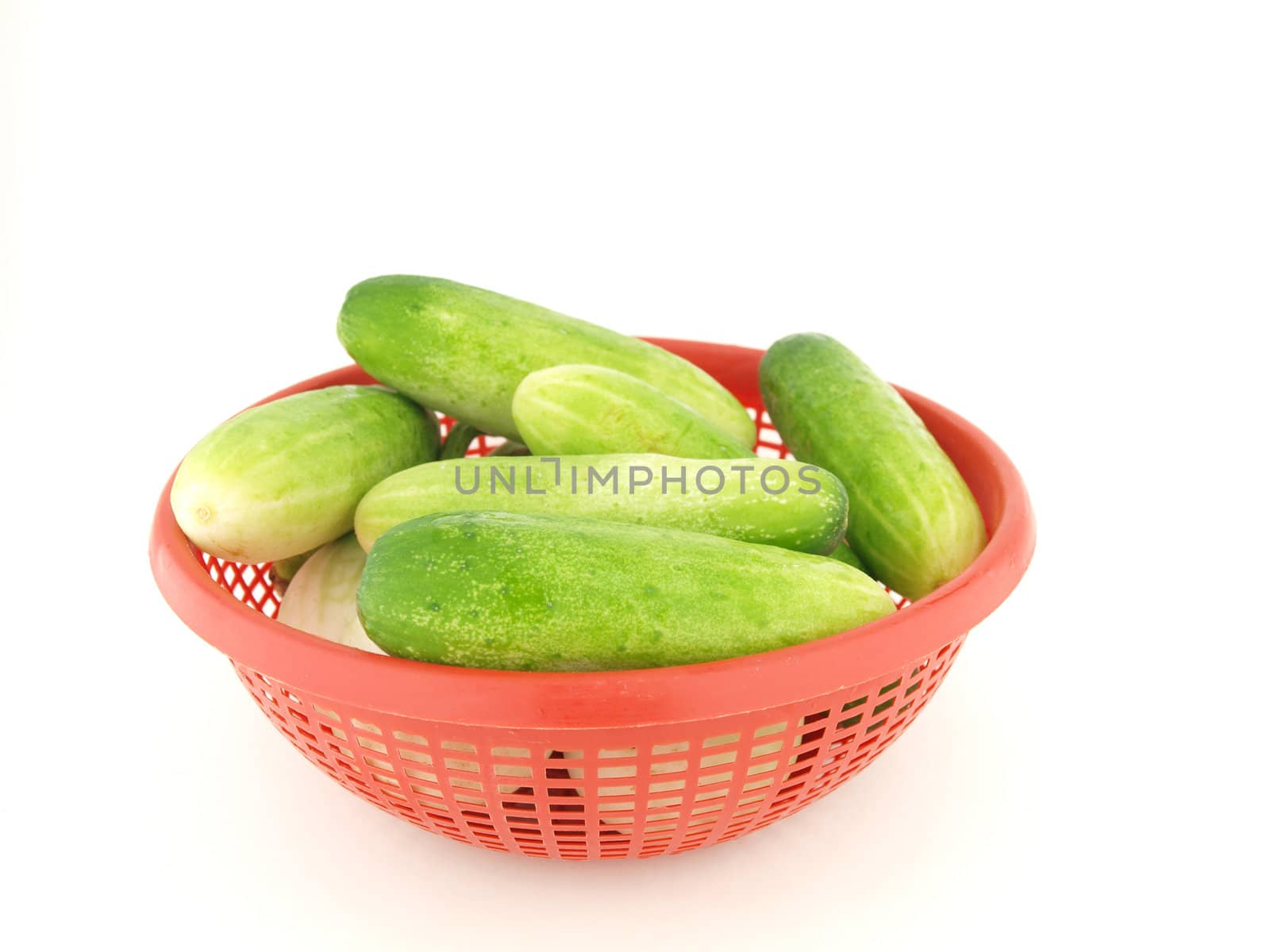 cucumber on red basket by jakgree