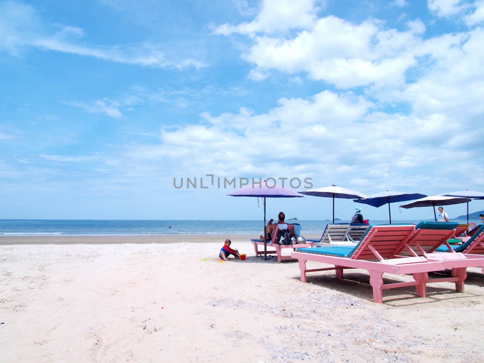 Beach chair and Umbrella on the beach , Huahin Thailand