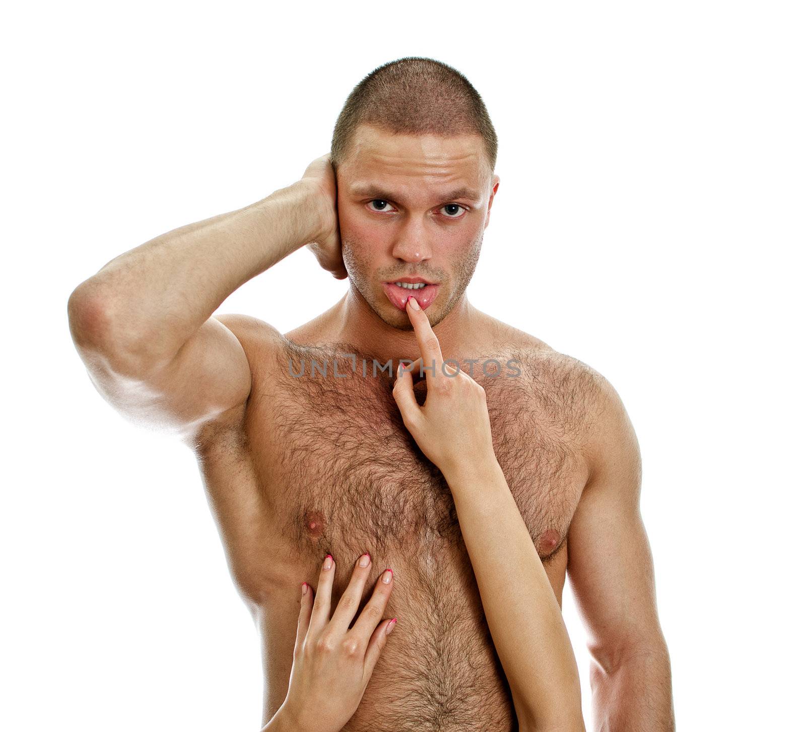 Woman's hands touching man's lips. Isolated on white.