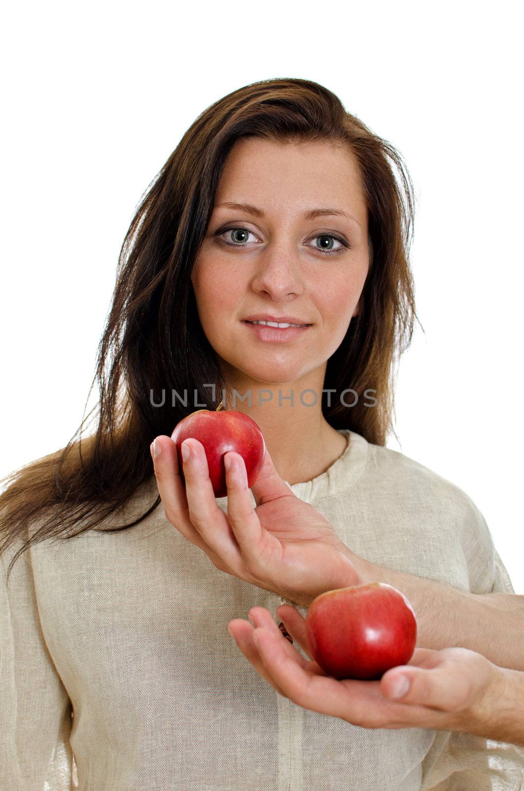 Two man's hand offering an apple to woman. Isolated on white.