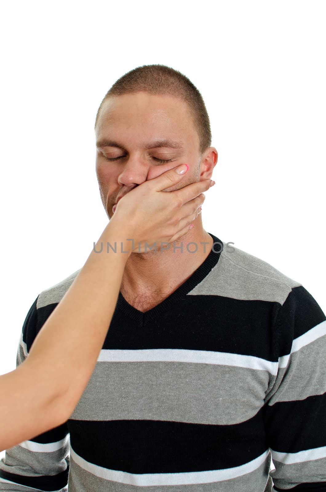 Woman hand slapping man's face. Isolated on white.