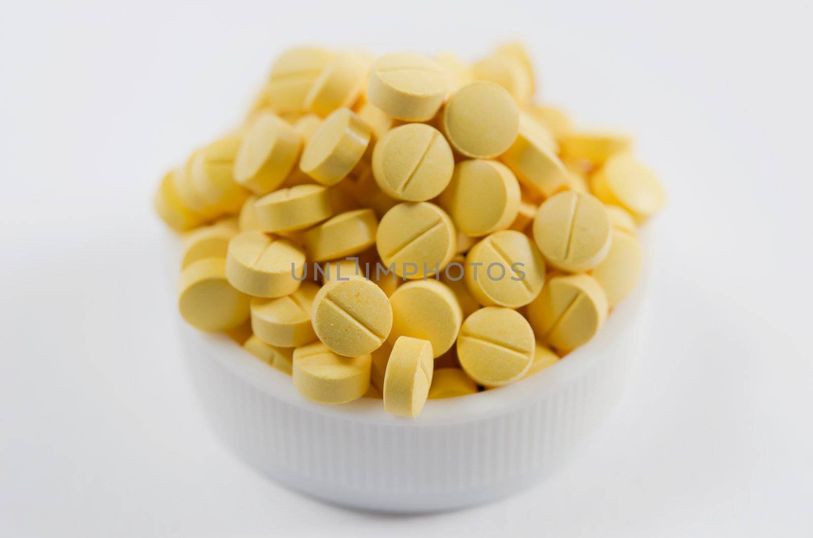 full of  yellow medicine  on the white