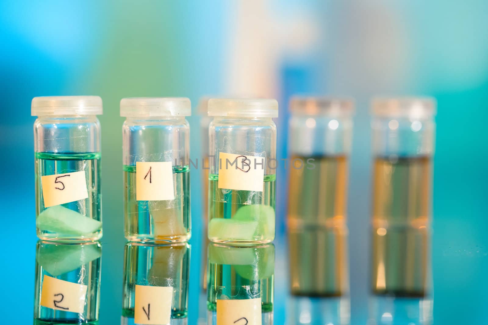 Three samples in plastic vials for microscopy and biopsy tissue . biological laboratory