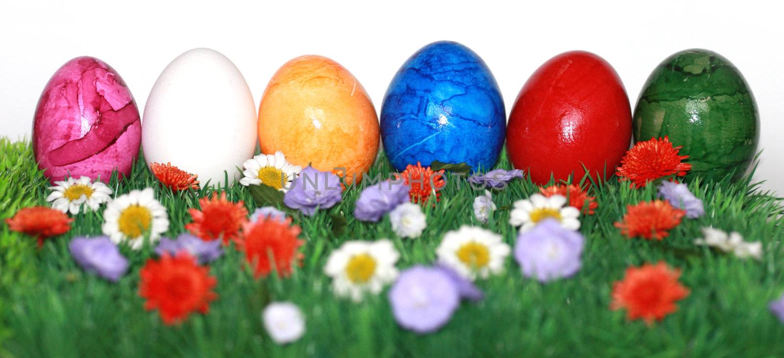 Colorfully painted Easter eggs by photochecker