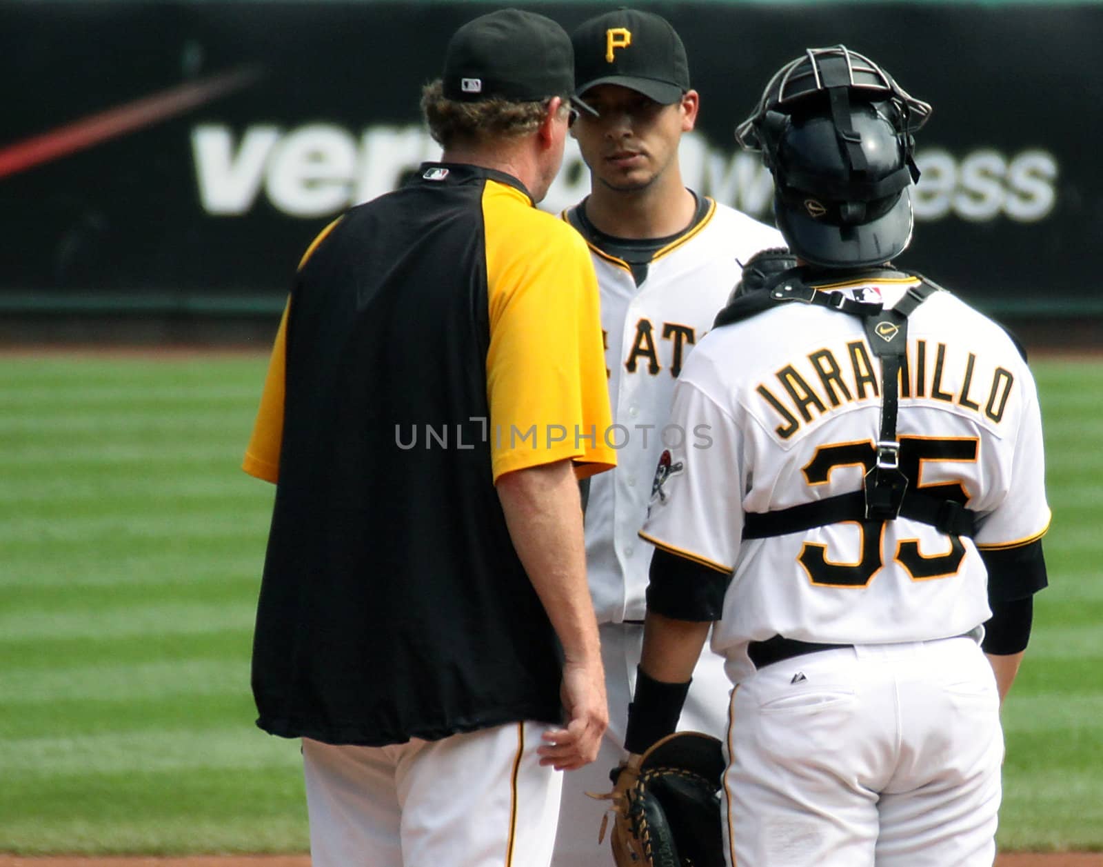 PITTSBURGH - SEPTEMBER 24: Pittsburgh Pirates' pitching coach, Joe Kerrigan speaks with Charlie Morton during a game against Cincinnati Reds on September 24, 2009 in Pittsburgh, PA.