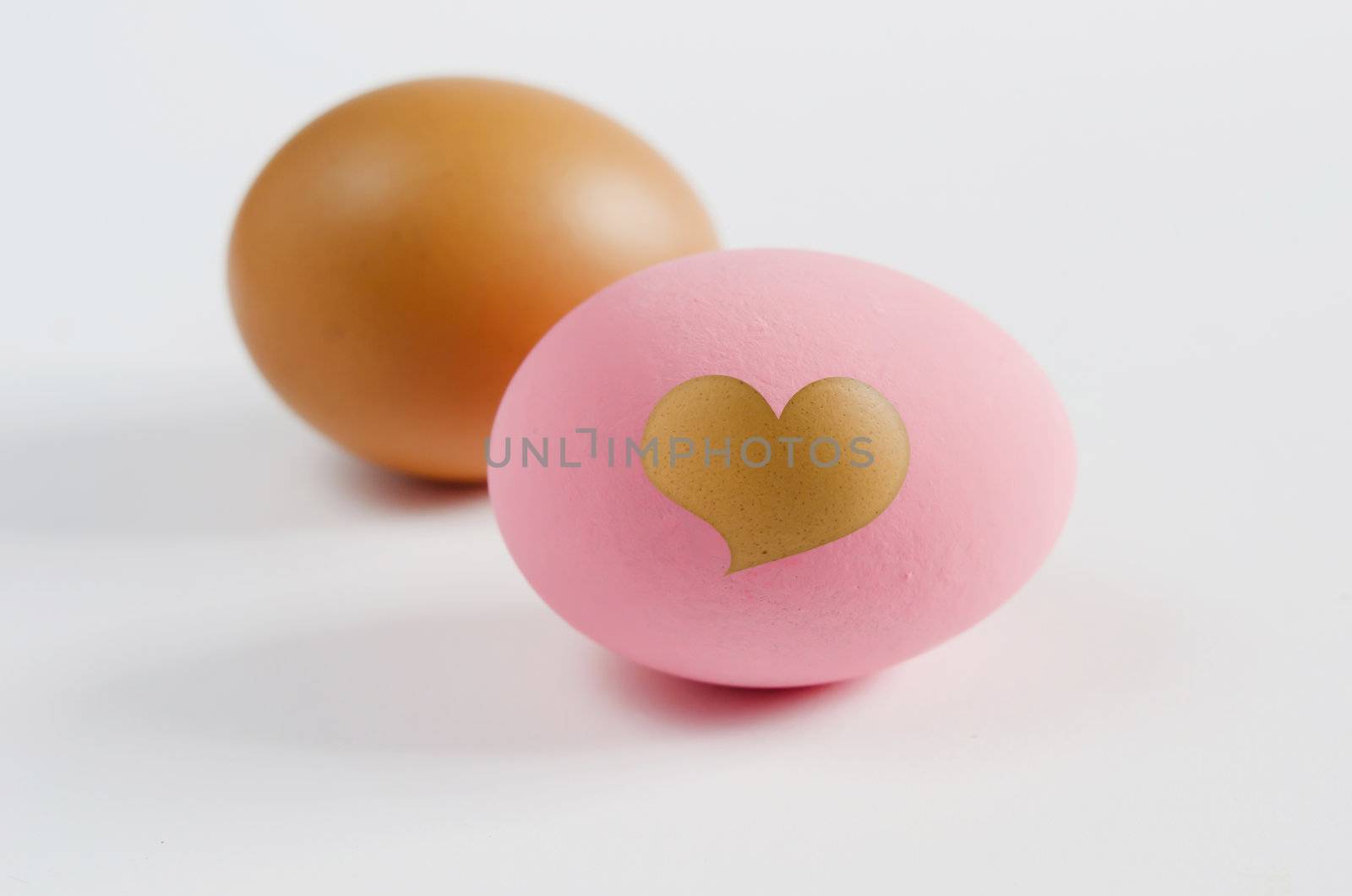 one thousand year eggs with heart shape and egg on white background