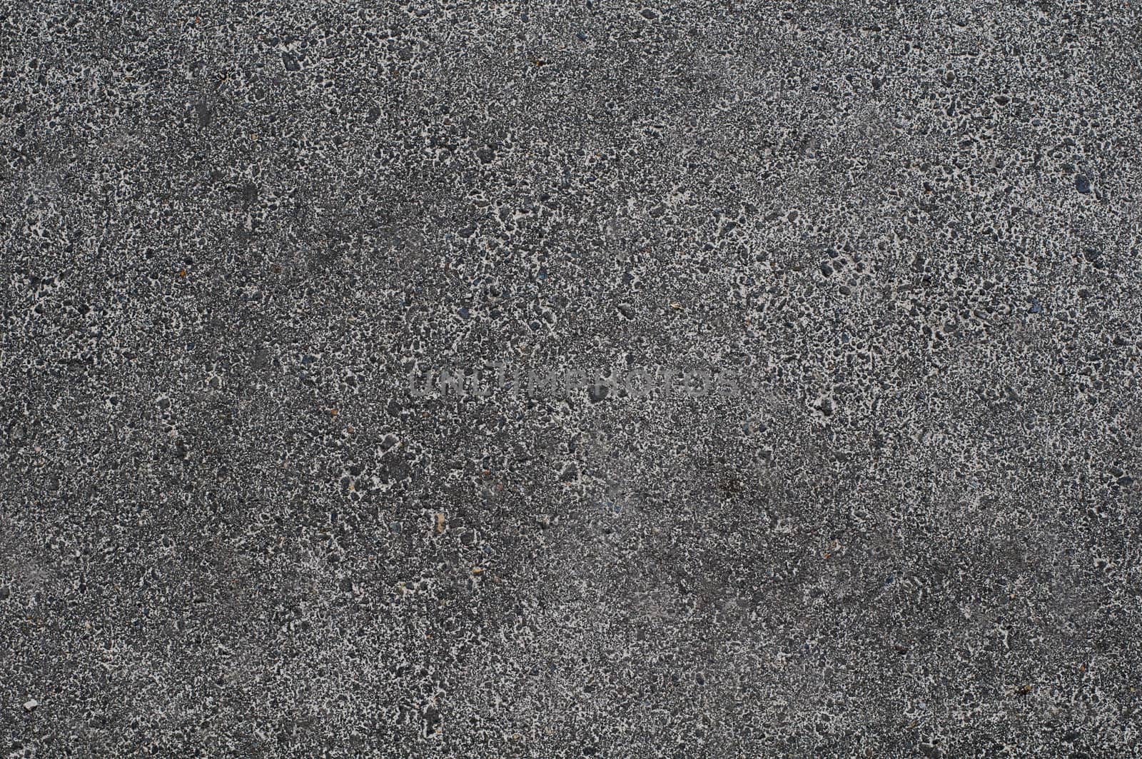 Photo of gray asphalted surface background. Close up