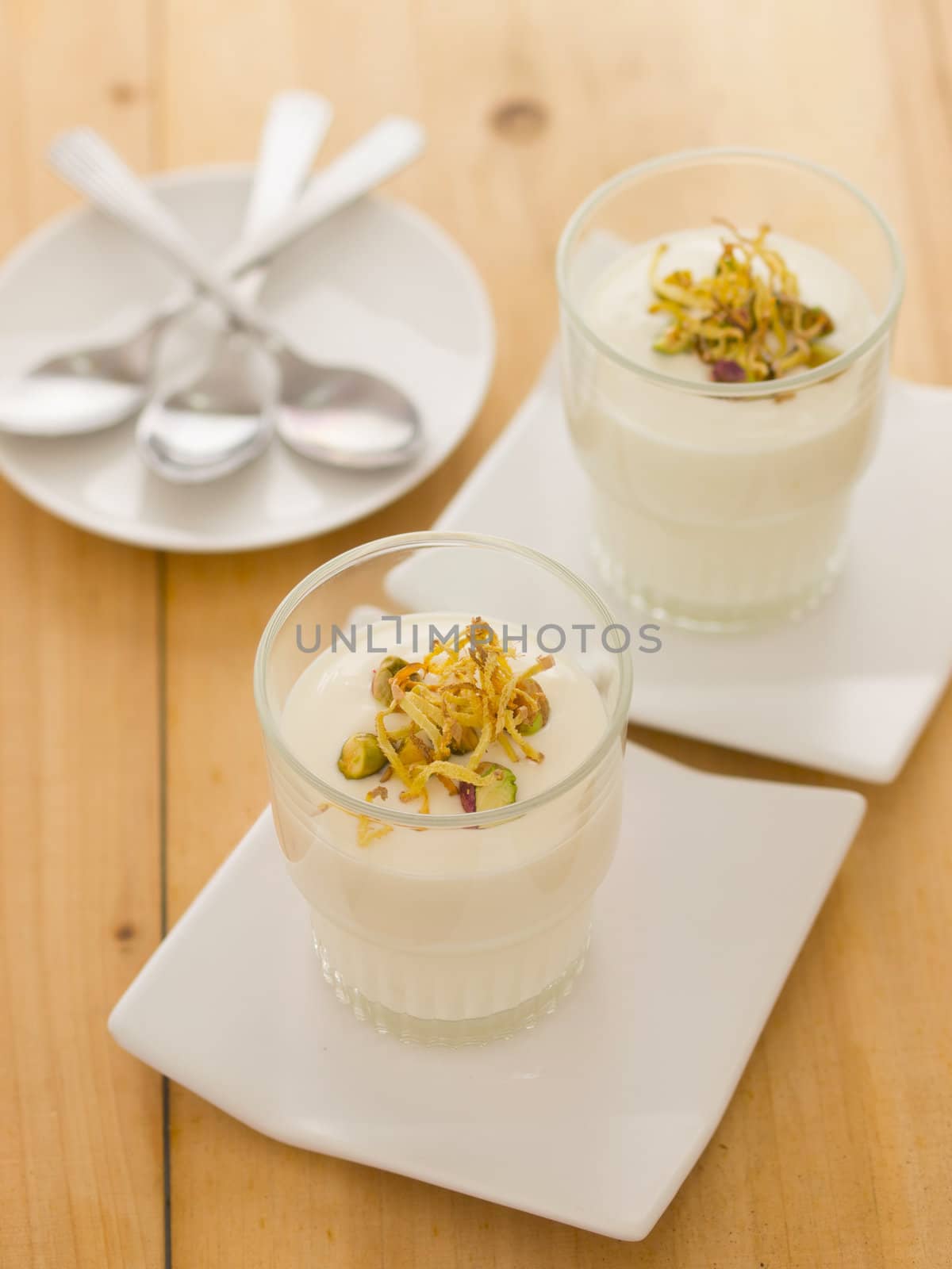 close up of cups of indian shirkhand dessert