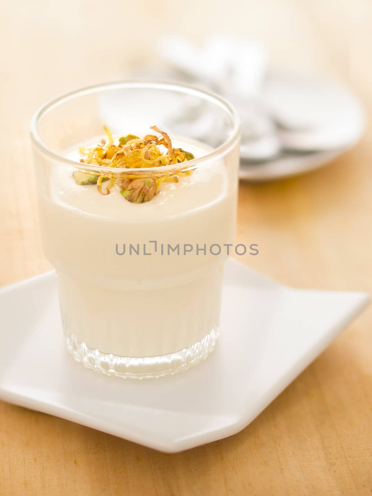 close up of a cup of indian shirkhand dessert