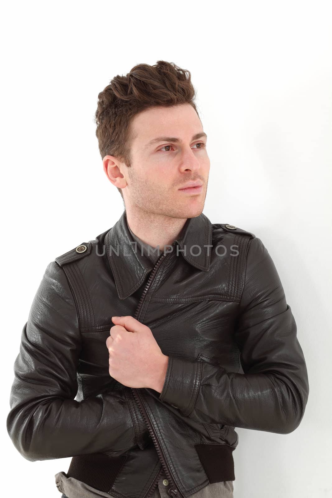 Young russian model on white background with leather jacket